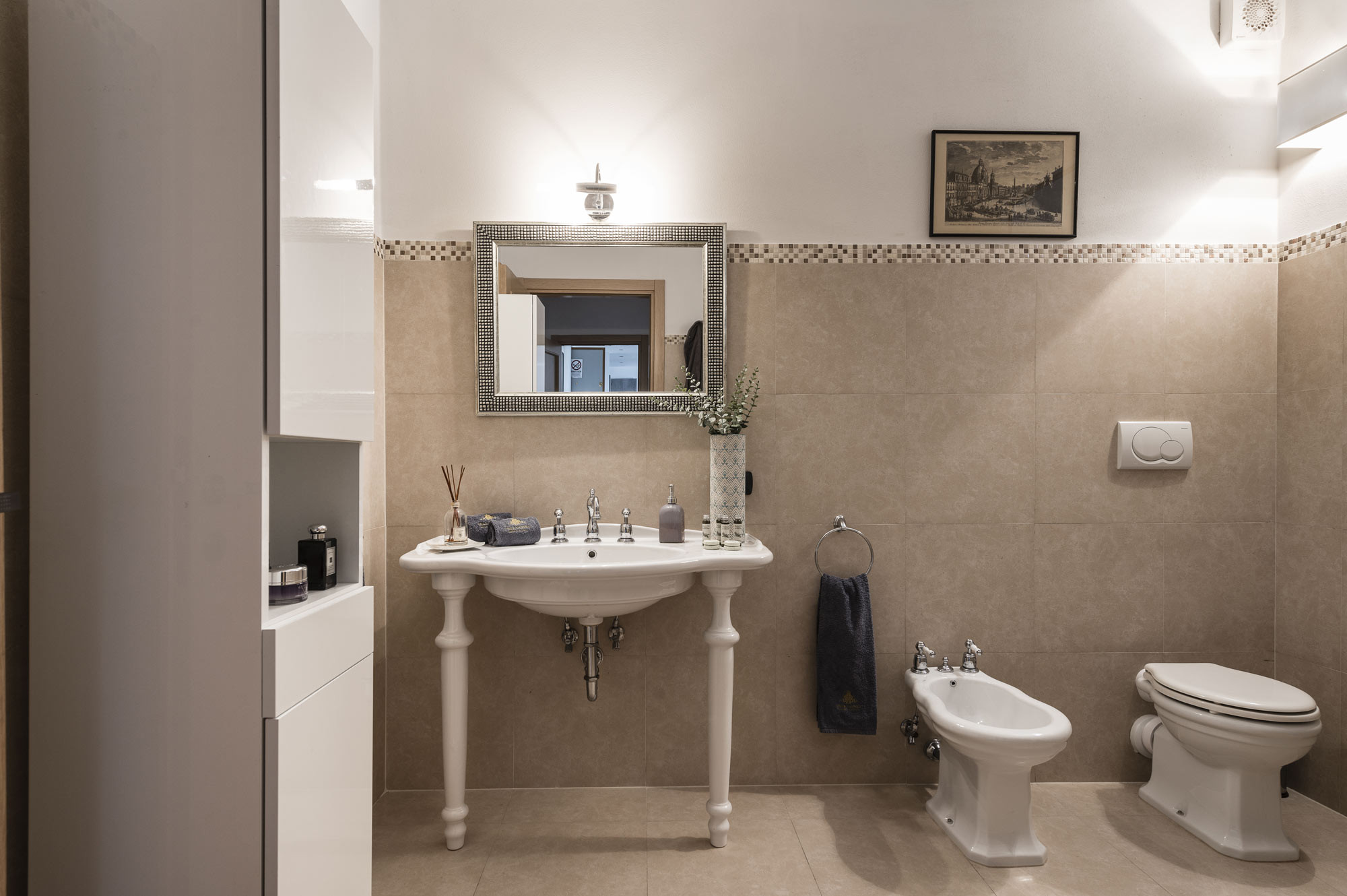 media.Slide-caravaggio-toilette-chiara-lavandino